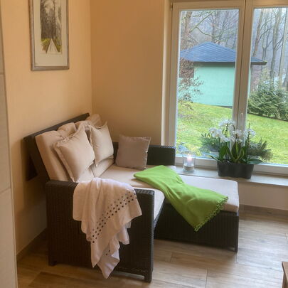 Sitzbereich in der Sauna im Forsthaus Kirnitzschtal Pura